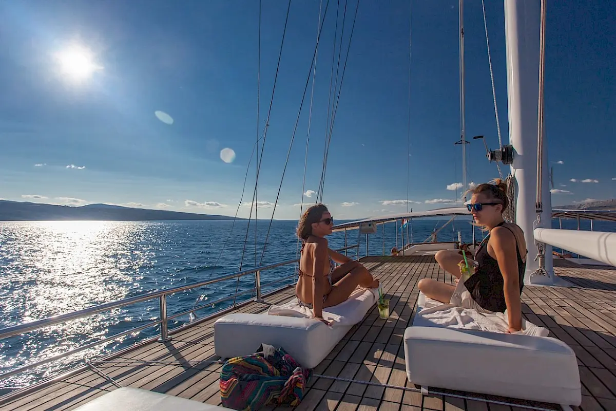 Sunbathing during yacht cruise in Croatia